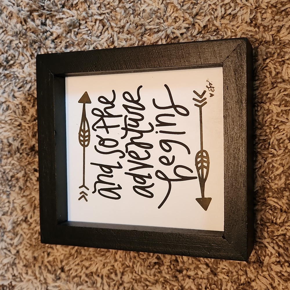 And So The Adventure Begins accent sign